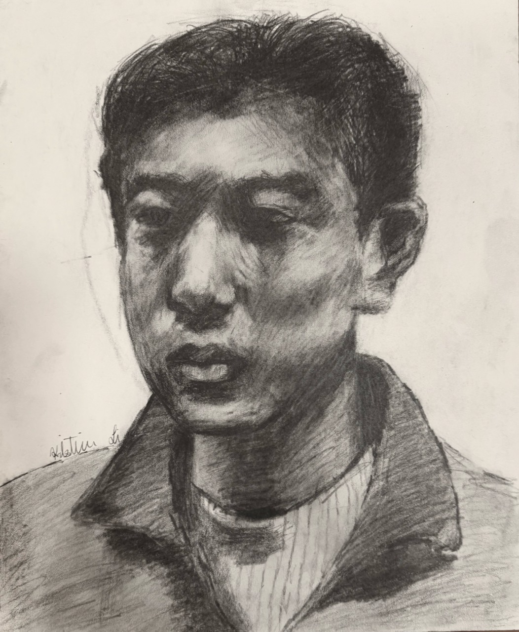 Graphite portrait of a young man in a jacket
