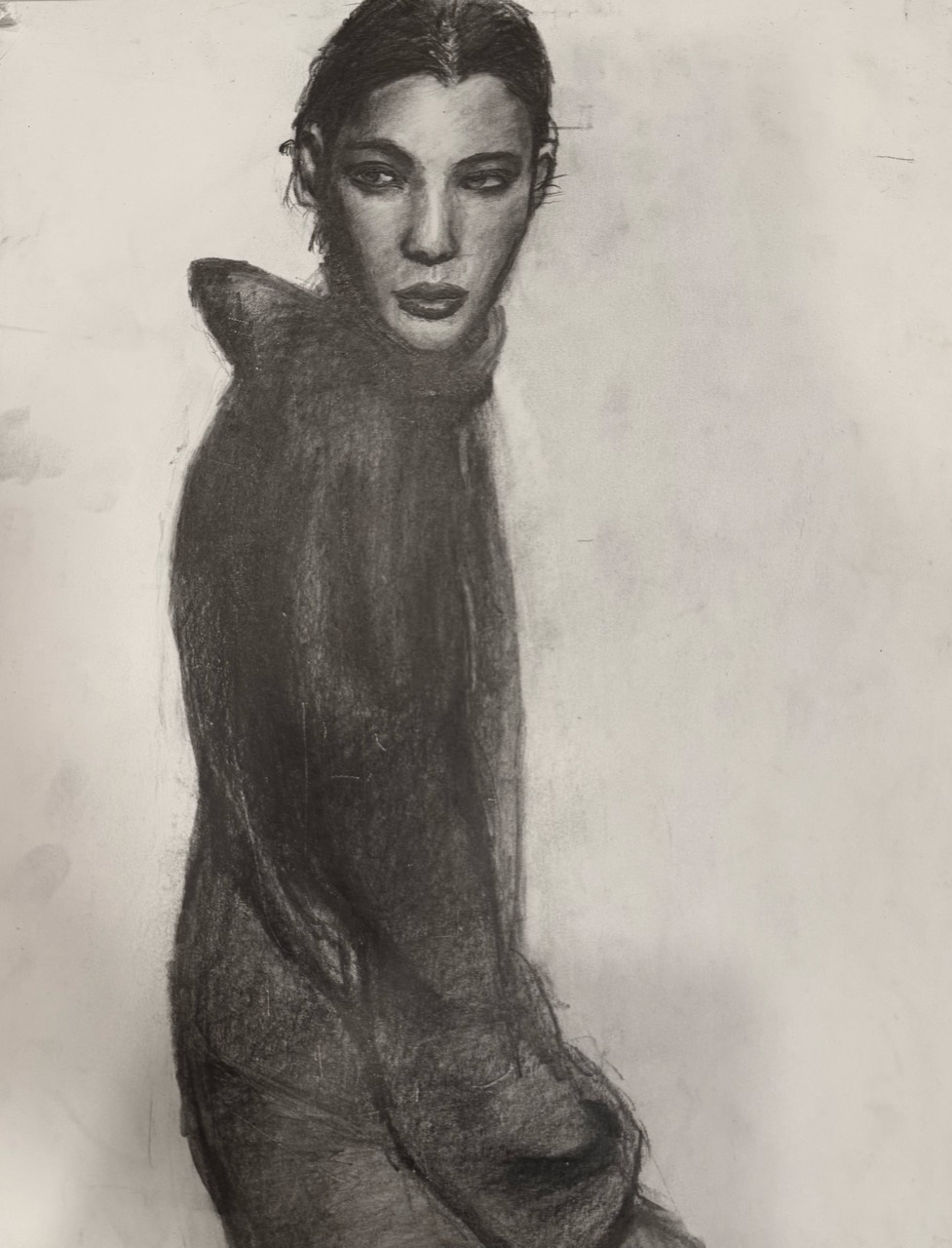Graphite figure study of a woman in a dark coat