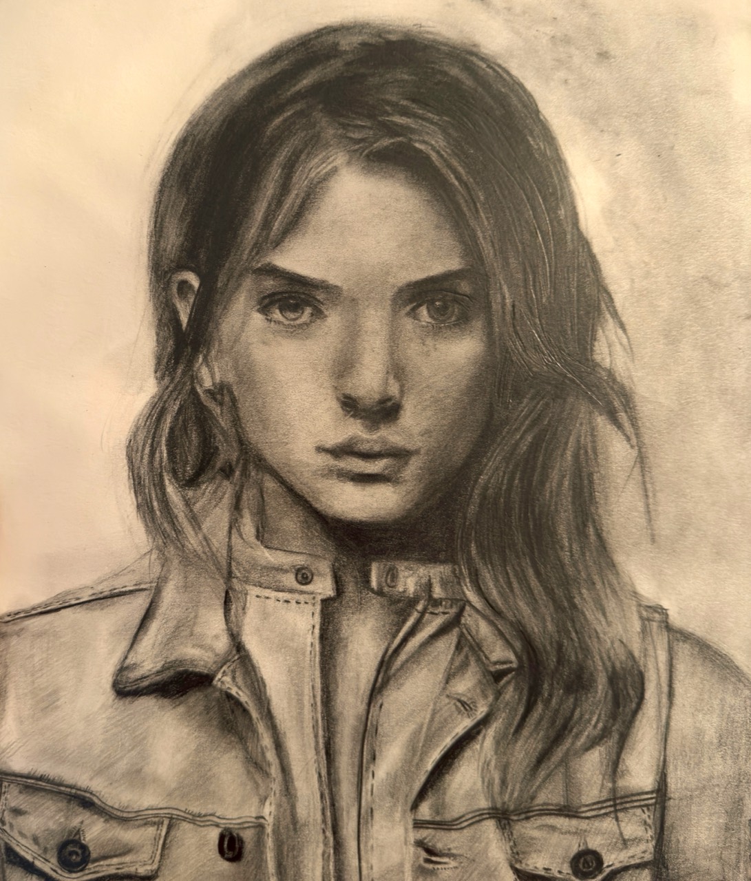 Graphite portrait of a woman wearing a leather jacket