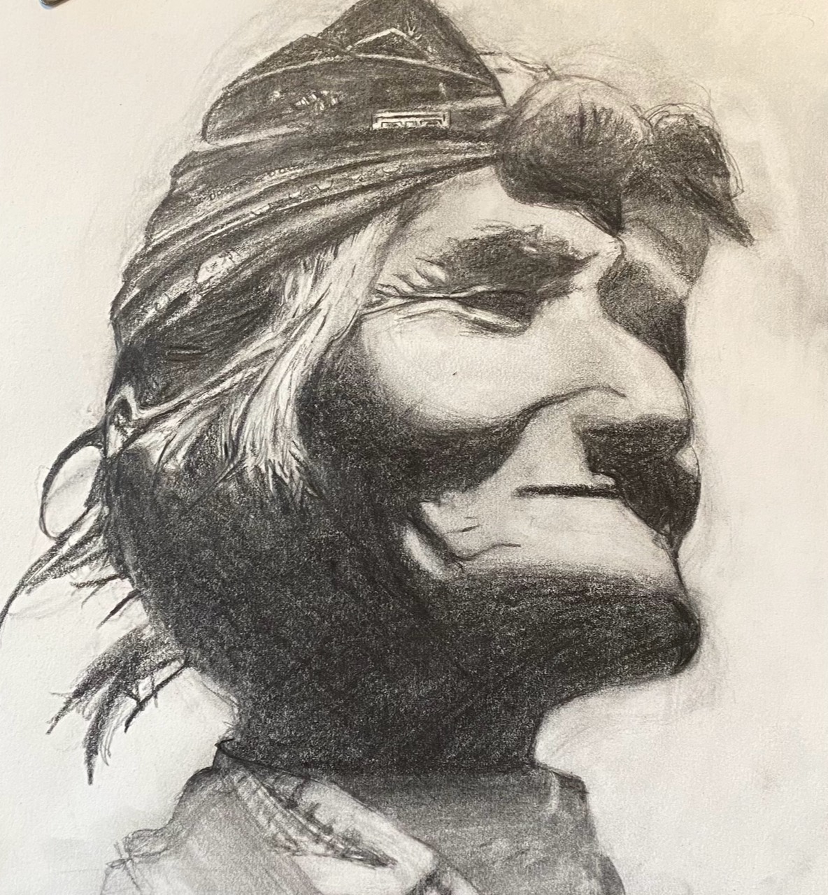 Graphite portrait of a bearded man wearing a turban